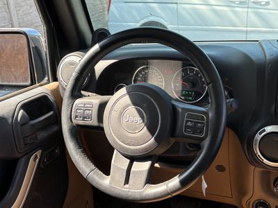 Jeep Wrangler 2012   Unlimited Sport 3.6L V6 A/T | img. 17